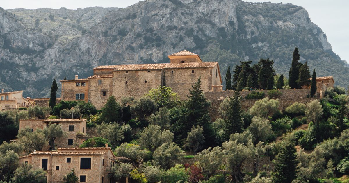 Deià mountain village with stone buildings in the Serra de Tramuntana