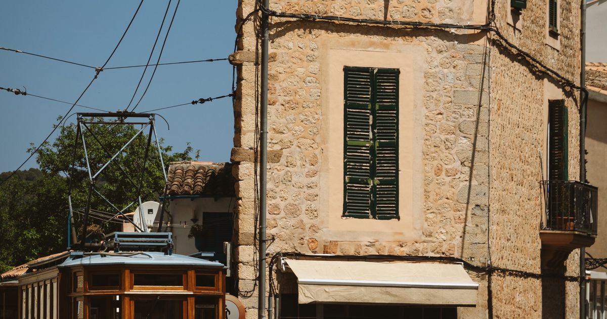 Historic tram of Sóller running through the old town